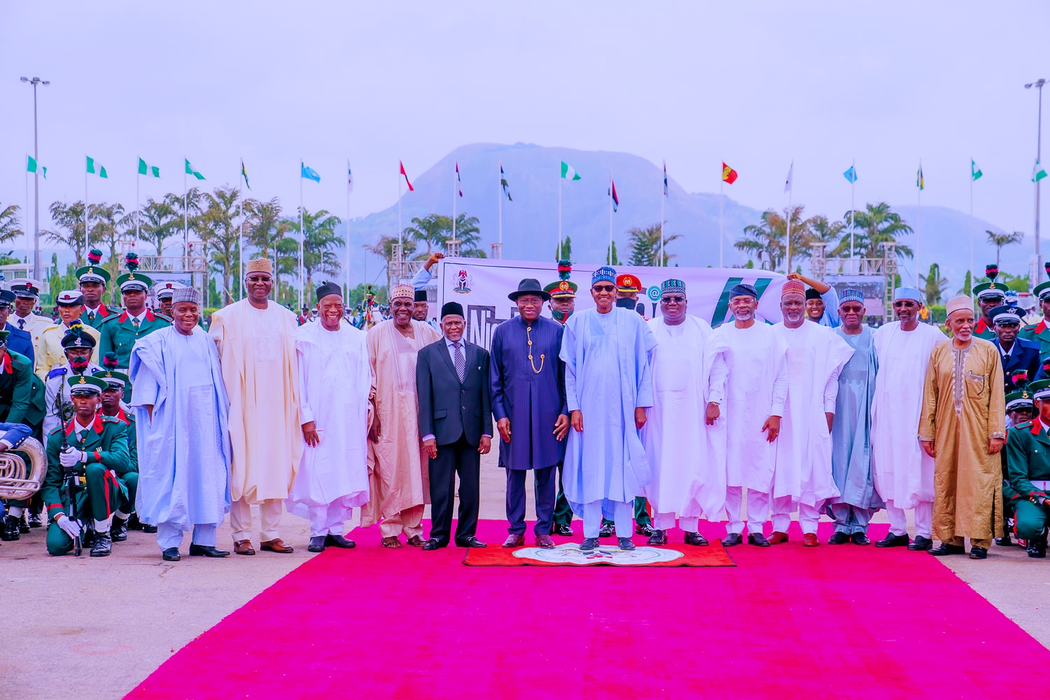 President Buhari with L-R: Minister of Defence Maj. Gen. Bashir Magashi (Rtd), SGF Boss Mustapha, APC National Chairman Abdullahi Adamu, Special Envoy to Lake Chad Amb. Babagana Kingibe, Chief Justice of Nigeria Justice Ibrahim Tanko Mohammed, Former President Goodluck Jonathan, Senate President Ahmed Lawan, Speaker Femi Gbajabiamila, Deputy Speaker Admed Idris Wase, COS Prof. Ibrahim Gambari, FCT Minister Muhammad Bello and Dean of Diplomatic community and High Commissioner of Cameroon Amb. Salaheddine Abbas at the 2022 Democracy Day Celebration at the Eagle Square, Abuja on 13th June 2022