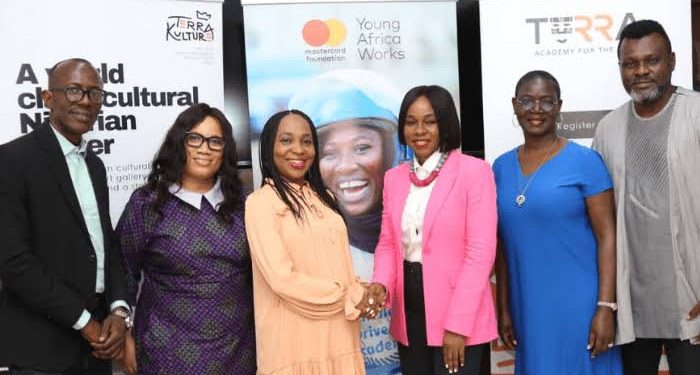 L-R: Lead, Safeguarding, Mastercard Foundation, Oluranti Adetoye; Program Lead, MSME Finance, Mastercard Foundation, Chioma Nwagboso; Country Head - Nigeria, Mastercard Foundation, Chidinma Lawanson; Founder, Terra Kulture and BAP Productions, Bolanle Austen-Peters; Program Lead, Agriculture, Mastercard Foundation; Lois Sankey and the General Manager, Terra Kulture, Joseph Umoibom during the signing of a 5-year training partnership program agreement between Terra Kulture and the Mastercard Foundation to equip 65,000 young people with relevant skills across key sub-sectors in theatre and business.